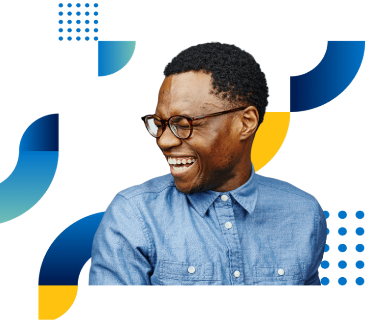 Image of a man with glasses laughing.